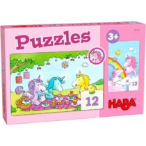 Puzzle Haba - Puzzles Flash Unicórnio, numa caixa rosa, apresenta um design colorido com unicórdios em um piquenique.